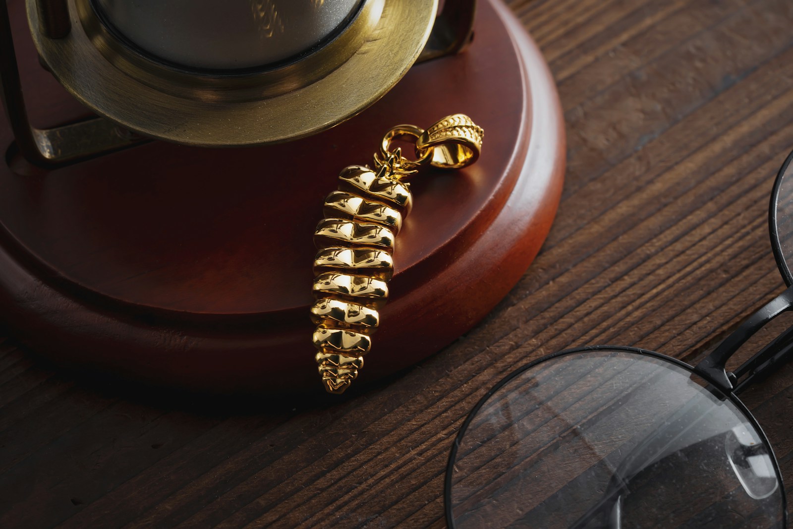 a pair of glasses sitting on top of a wooden table